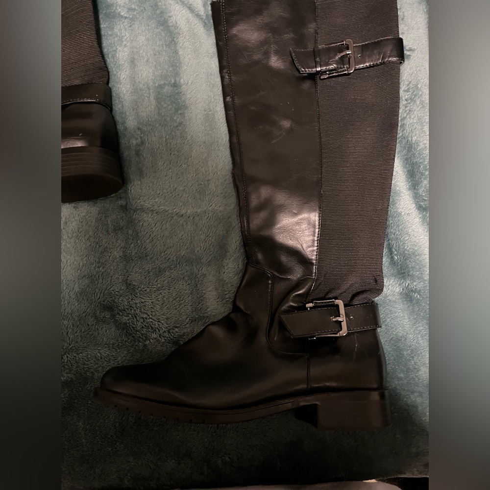 Black riding boots. Used with pictures of scuff marks and scratches